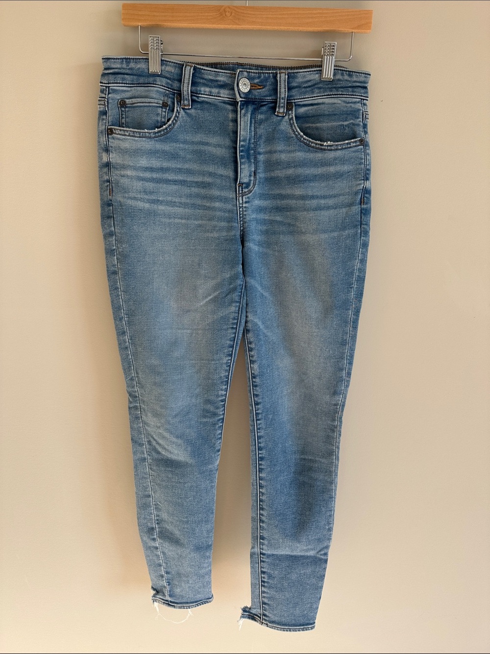 American Eagle Hi-Rise Medium Wash Women's Jeggings with Cropped, Distressed Hem